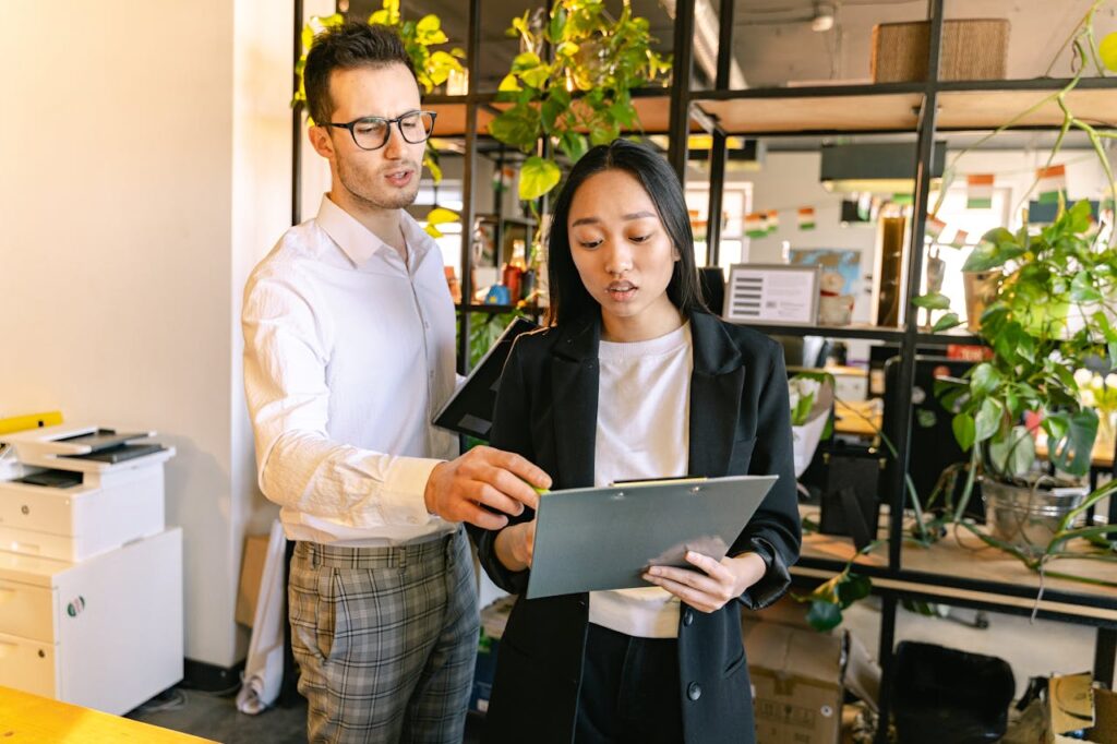 SBDC Business Advisor and client in office